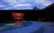 iRidium-based project (Outdoor Stealth Home Theater)